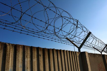 Wall with barbed wireの写真素材