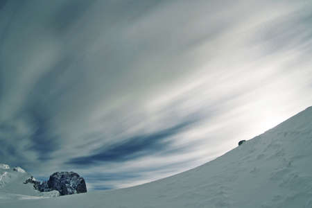 Sunny day on dolomites, long exposure and moving cloudsの写真素材