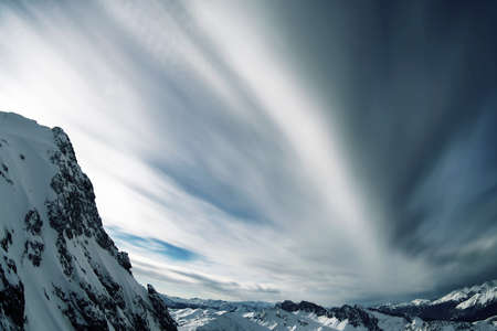 Sunny day on dolomites, long exposure and moving cloudsの写真素材