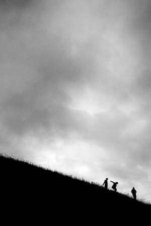 Boys and girls play and run on the mountain