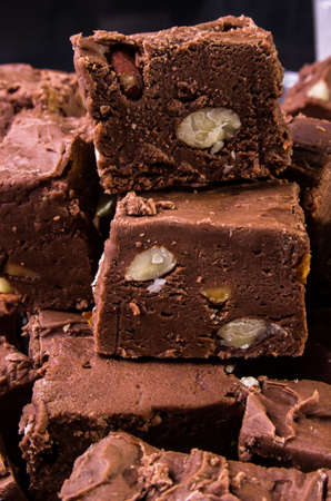 Almond fudge is sliced and stacked on a plate, ready to be servedの写真素材