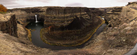 The Palouse River goes over a waterfall and around a bend at Palouse Falls in Eastern Washington...