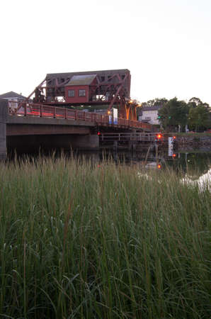 A bascule bridge in Boston Ma, with river grasses.