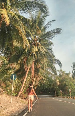 Walking with the palm tree in Cebu, Philippinesの写真素材