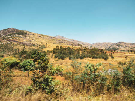 water flow of the Mania river near rice terraces in central Madagascarの写真素材