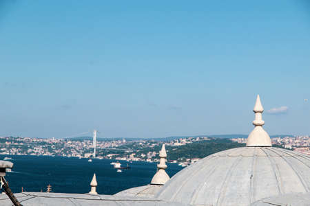 Mosque dome silhouette with Bosphorus landscape in Golden Horn of Istanbul city in Turkeyの写真素材