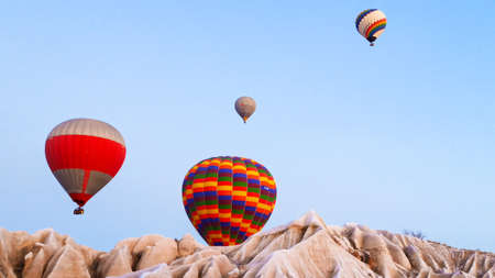 Lots of Hot air balloons at the sunrise sky landscape in Cappadocia, Turkeyのeditorial素材