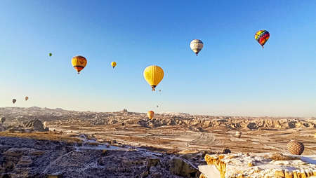 Lots of Hot air balloons at the sunrise sky landscape in Cappadocia, Turkeyのeditorial素材