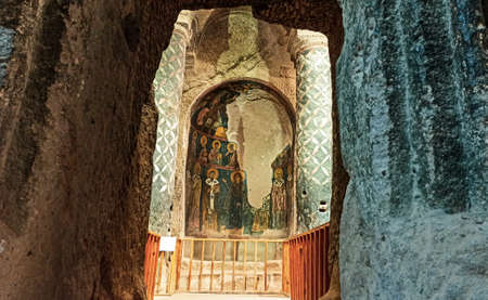 Gumusler Monastery from inside. Sacred Frescos on the wall of the Cave Church in Cappadociaのeditorial素材