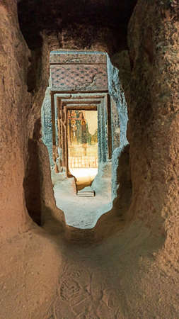 Gumusler Monastery from inside. Sacred Frescos on the wall of the Cave Church in Cappadociaのeditorial素材