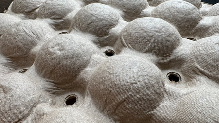 Close-up of the texture of a white plastic bag with holes