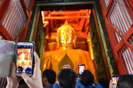 Ancient Buddha statue in Thailandの写真素材