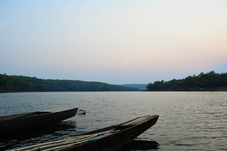 Rowing boats moored on the riverの写真素材