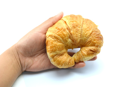 fresh croissant on white backgroundの写真素材