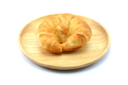 fresh croissant on white backgroundの写真素材