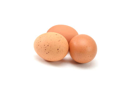 Fresh eggs on white backgroundの写真素材