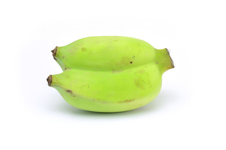 Green bananas isolated on white backgroundの写真素材