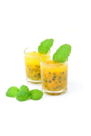 Passion fruit juice on white backgroundの写真素材