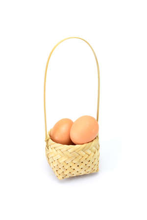 eggs basket and white backgroundの写真素材