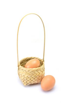 eggs basket and white backgroundの写真素材