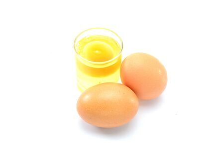 Fresh egg in a glassの写真素材