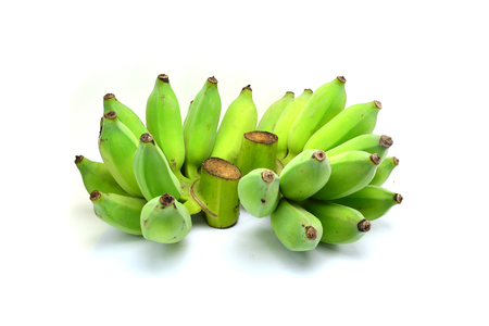 Green bananas isolated on white backgroundの写真素材
