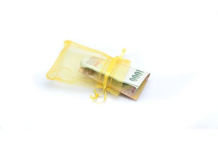 Thai money banknotes on white backgroundの写真素材