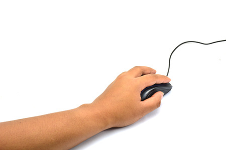 computer mouse in hand isolated on whiteの写真素材