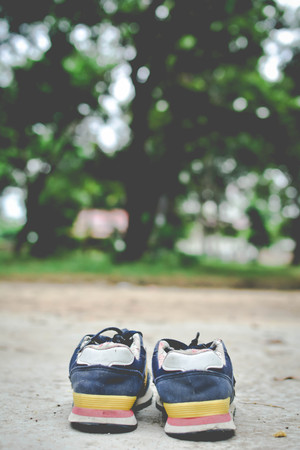 sneakers on nature .hipster tone and selective focusの写真素材