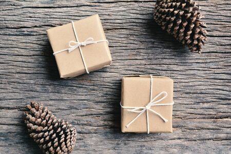 pine cones and gift on old wood,christmas concept. Soft focusの写真素材