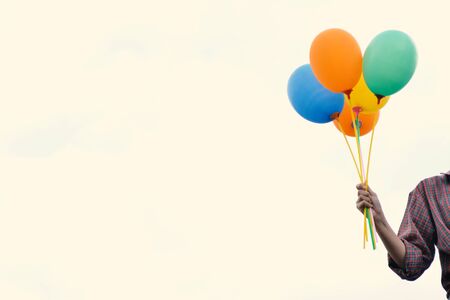 Asian women holding a balloon.concept travel color of vintage toneの写真素材