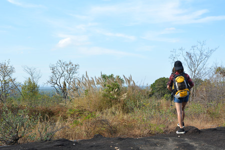 Happy Asian hipster women backpack in nature background, Relax time on holiday concept travel , soft focusの写真素材