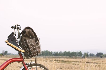 Jeans sneakers on bicycle ,Concept journey,hipster toneの写真素材