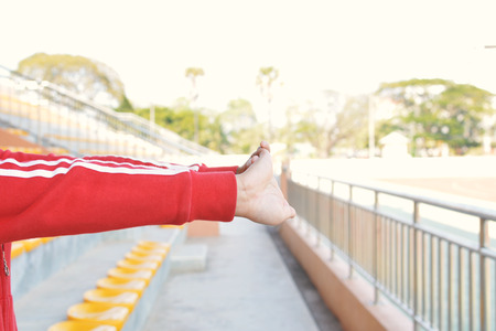 Young women exercise in stadium
