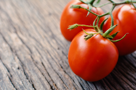 Hipster tone group of tomato on old wood background, selective and soft focusの写真素材