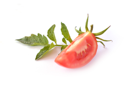 Fresh red tomatoes on white backgroundの写真素材
