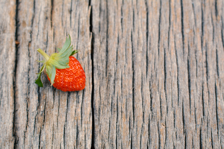 strawberry on wood backgroundの写真素材