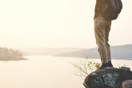 Happy Asian hipster man backpack in nature background, Relax time on holiday concept travel , color...