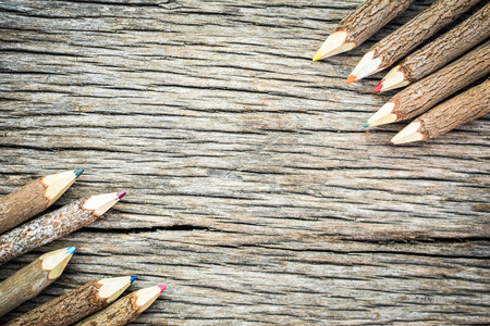 Pencil colors on old woodの写真素材