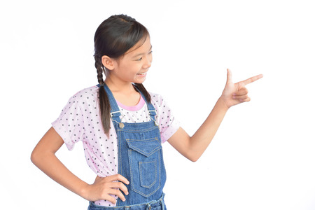 Portrait of little Asian girl on white backgroundの写真素材