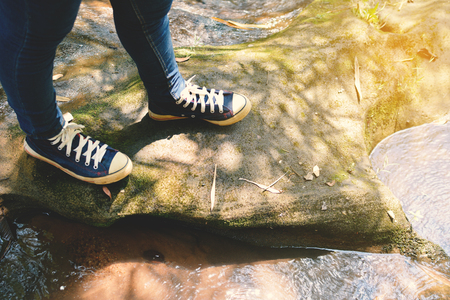 shoes on stone in nature concept walk in the forestの写真素材