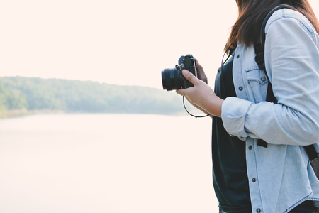 Hipster women travel in nature concept backpacker on holidayの写真素材