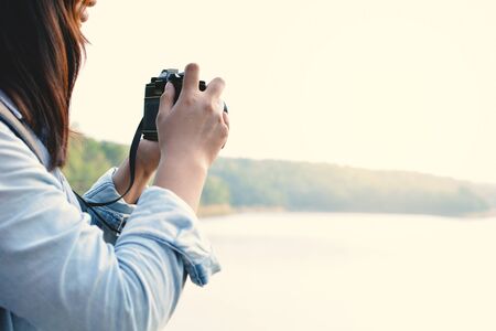 Hipster women travel in nature concept backpacker on holidayの写真素材