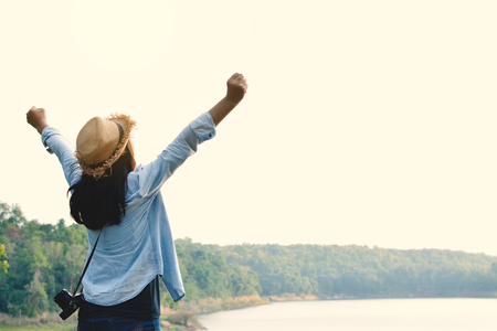 Hipster women travel in nature concept backpacker on holidayの写真素材