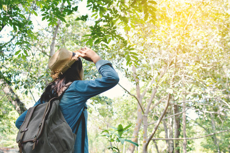 Hipster women travel in nature concept backpacker on holidayの写真素材
