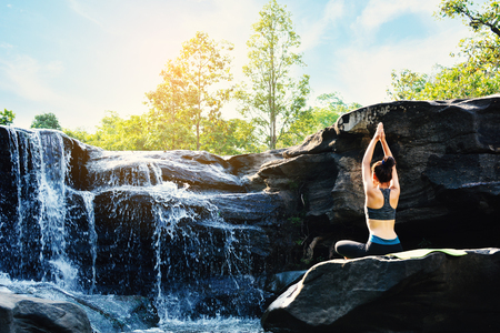 Beautiful women yoga in natureの写真素材