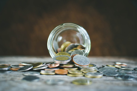 Close up  coin on wood background selective and soft focus hipster toneの写真素材