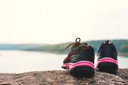 Close up of sports shoes in nature background,concept exerciseの写真素材