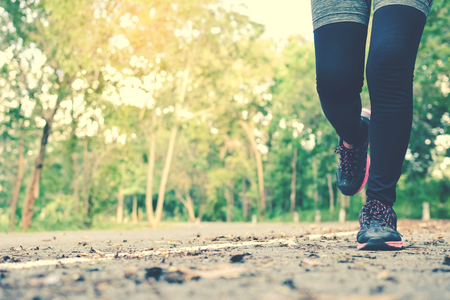 Women running on the road for health, color of hipster tone selective and soft focusの写真素材