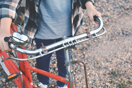 Happy Asian hipster women with bicycle color of vintage tone, Travel on holiday relax time, selective and soft focusの写真素材